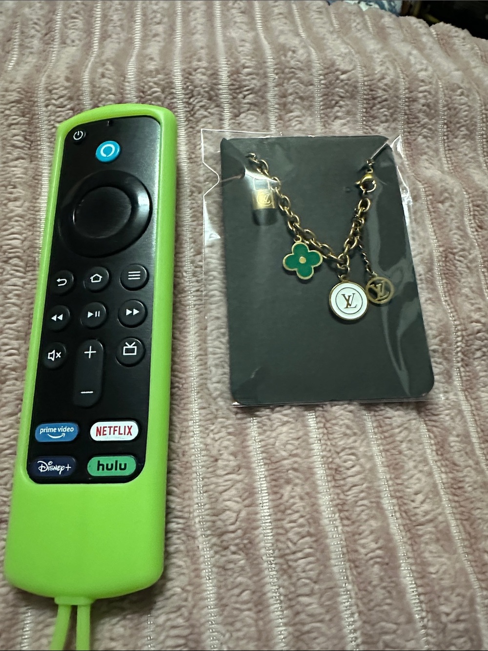 Gold-Tone Chain Bracelet with Green Flower and White Logo Disc